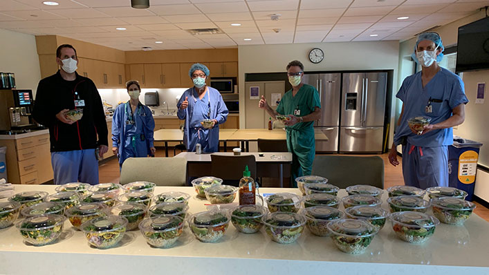 HealthPartners clinicians enjoy the meals packed by Steven Brown in the hospital kitchen.