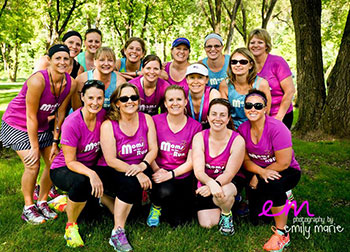 A group of women pose for a photo during a Moms on the Run event.