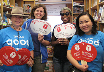 During the 2017 Rondo Days celebration, HealthPartners and St. Paul Public Library volunteers passed out fans from the Bookmobile.