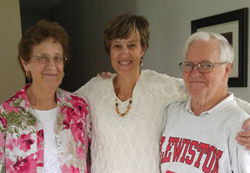 Image: Colleen, middle, with her mom and stepfather