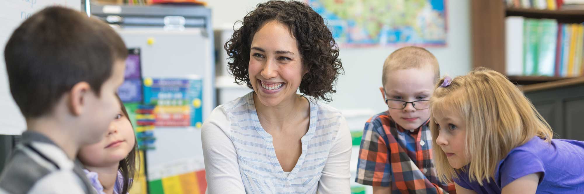 YouPower Banner Image: Smiling teacher 2023 